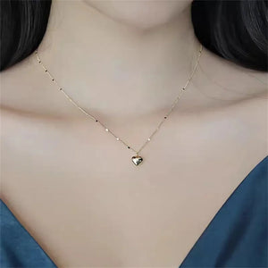 Collar de cadena de clavícula con un corazon